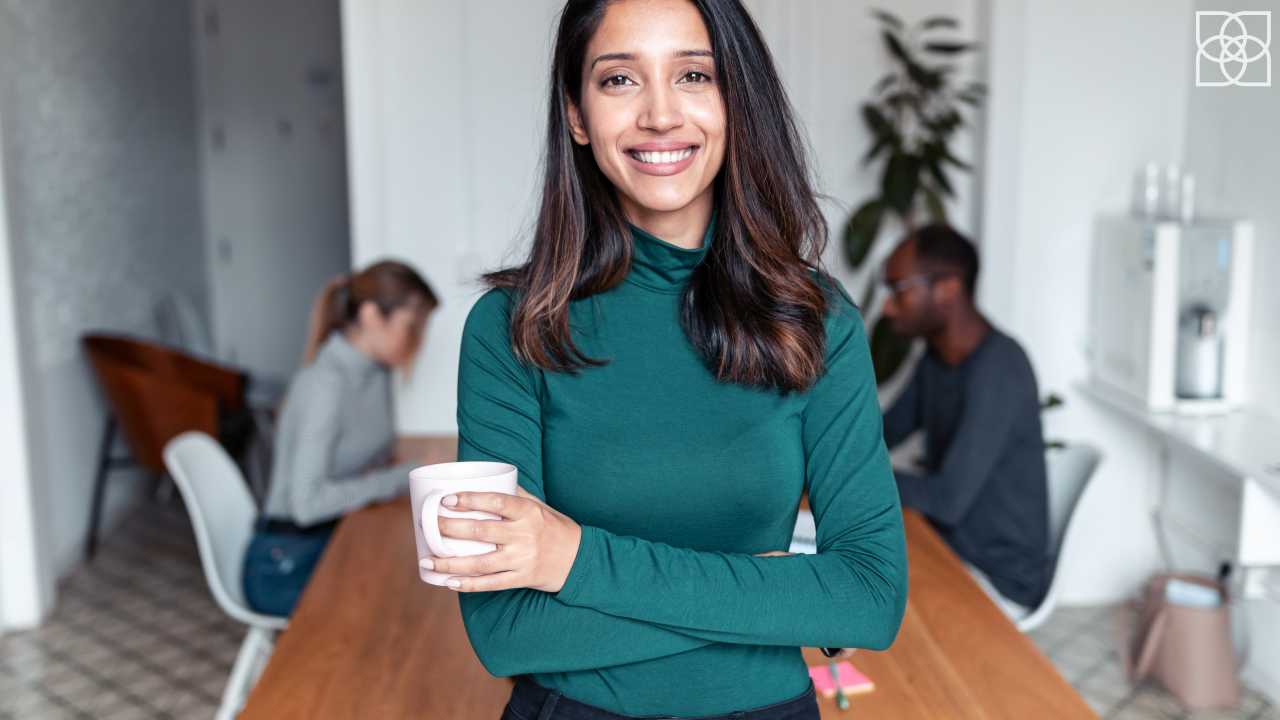 Woman holding coffee cup Image for 4 level clarity post